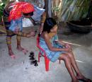 San Blas Island, Panama: Puberty ceremony where a girl gets her first haircut